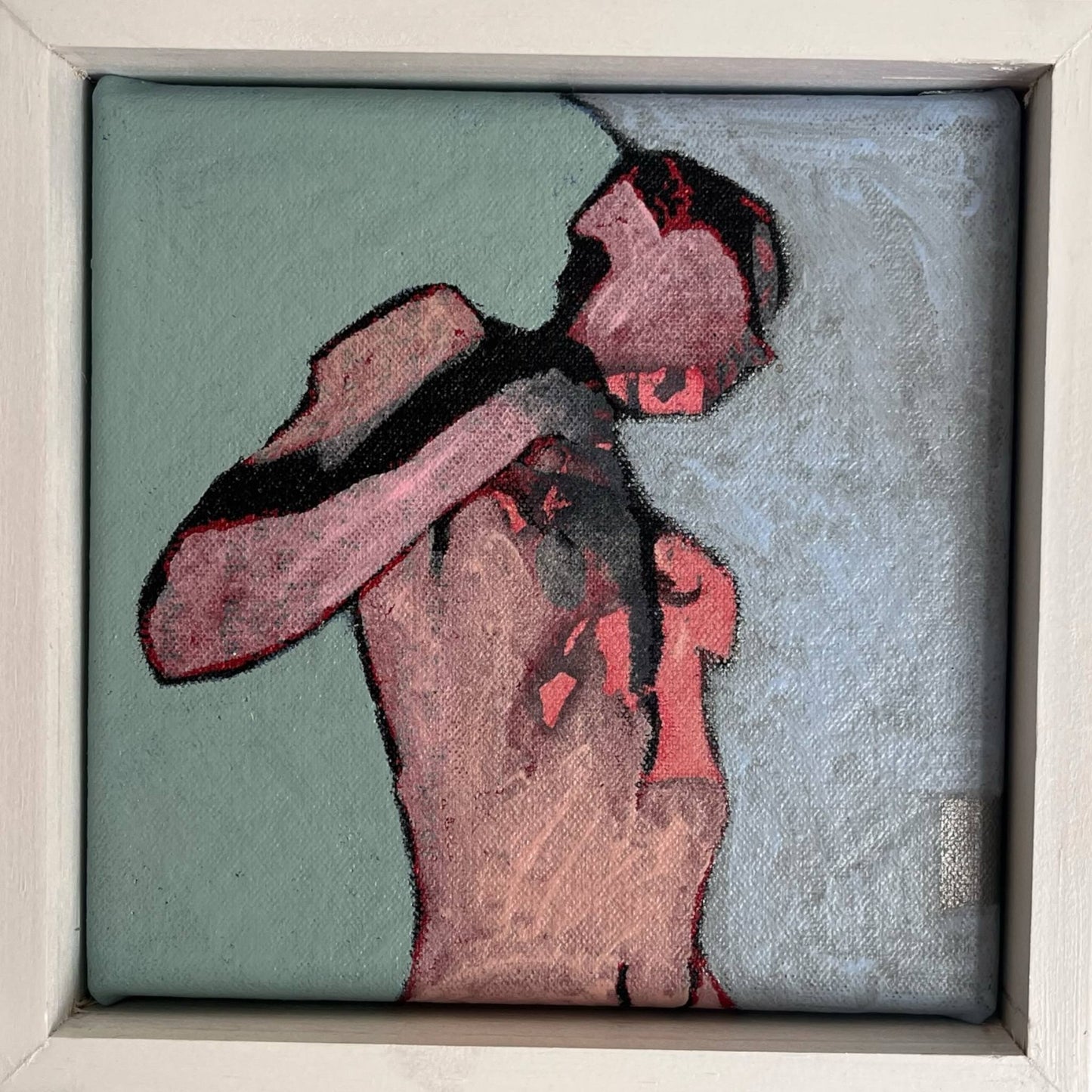An original mixed media painting on canvas of a figure on a turquoise background in a white wood frame by Annette Sullivan Art