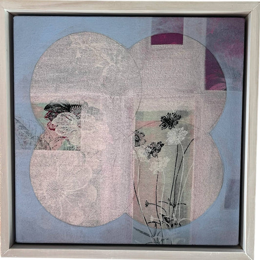 An original mixed media painting on canvas of flowers on a pink and light blue background in a white wash wood frame