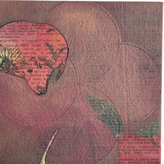 An original mixed media painting on canvas of flowers and on a pink background in a white wood frame by Annette Sullivan Art
